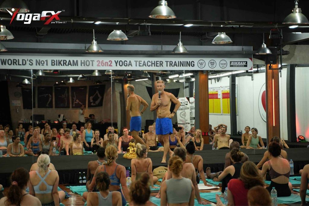 Instructor demonstrating proper alignment for the 26 postures and 2 breathing exercises.
