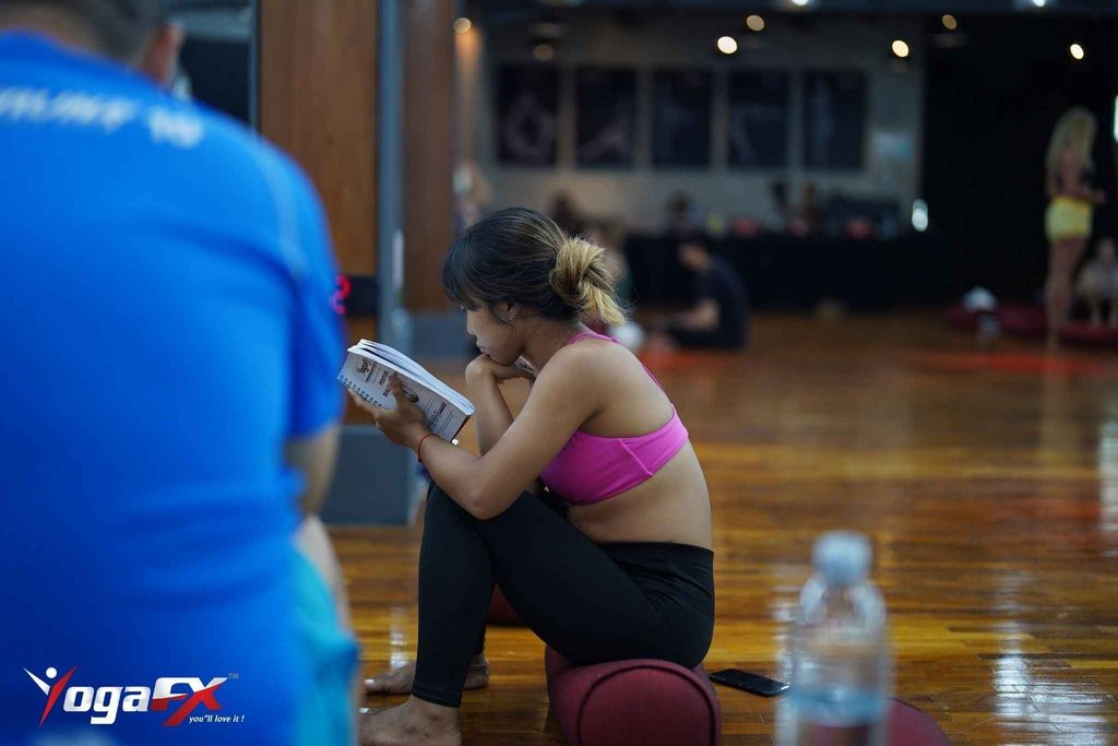 A guided 26 and 2 yoga class beside a mat on the floor, a simple way to follow the full sequence at home