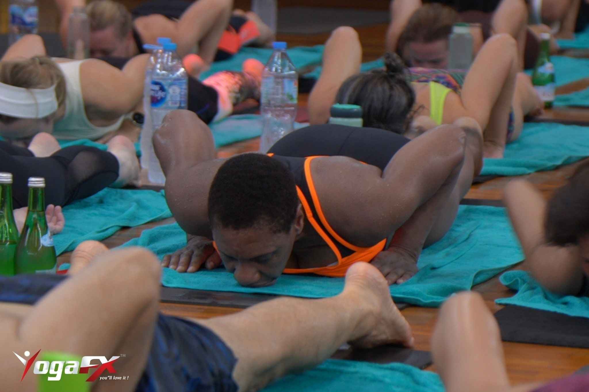 Hot yoga studio timetable listing Hot 26, Hot Hatha and Hot Flow classes, with the 26 and 2 sequence classes highlighted